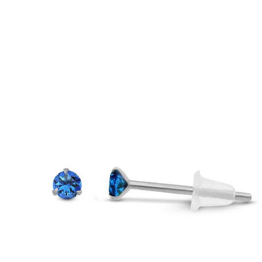 Boucle d’oreille élégante en or blanc avec zircon bleu marine brillant