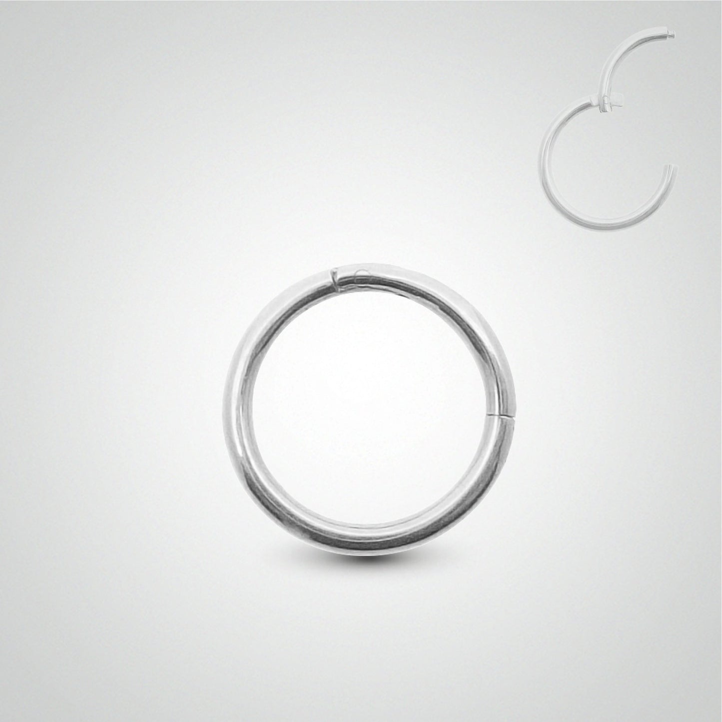 Piercing téton anneau: clicker en or blanc (pose manuelle, 1,6mm)