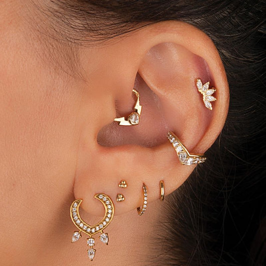 Piercing trinity en or jaune clipsable