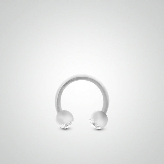 Piercing fer à cheval en or blanc avec boules et oxydes de zirconium (1,6mm)