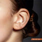 White gold conch piercing with purple zirconium oxide - 2mm