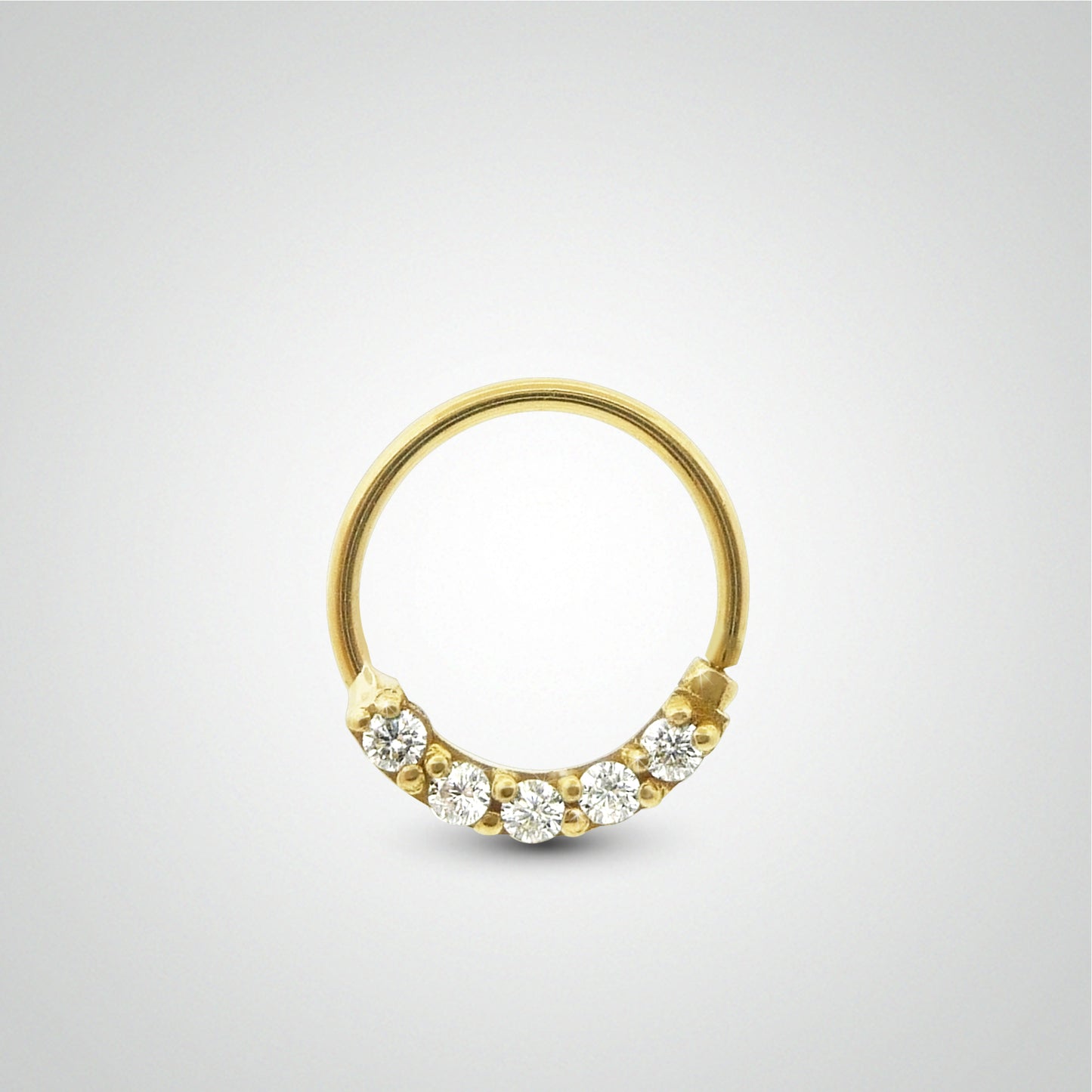 Piercing hélix anneau à écarter en or jaune et zircons
