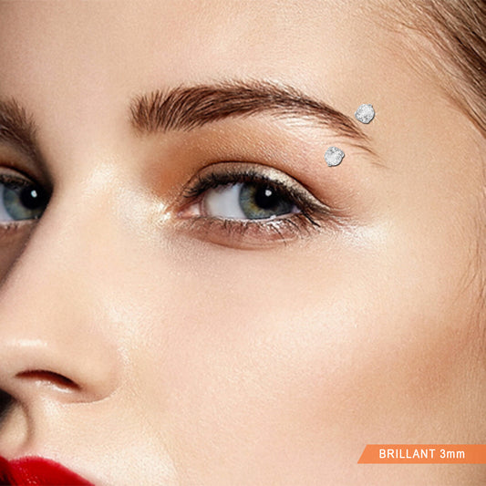 Piercing arcade or blanc 18 carats deux zircons 3 mm