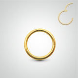 Piercing d'hélix anneau clicker en or jaune (pose manuelle)