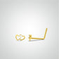 Yellow gold heart nose piercing