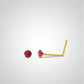Yellow gold ruby ​​nose piercing