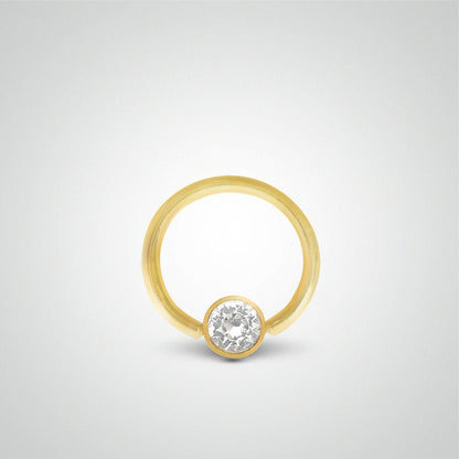 Piercing de sexe anneau en or jaune avec boule et oxyde de zirconium (1,2mm)