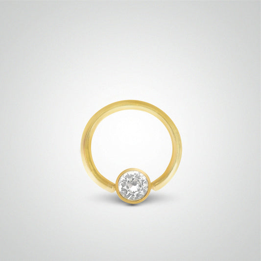 Piercing de sexe anneau en or jaune avec boule et oxyde de zirconium (1,6mm)