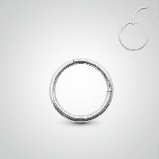 Piercing de téton anneau clicker en or blanc pose manuelle (1,2mm)