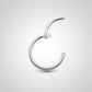 White gold clicker ring tragus piercing (manual placement)
