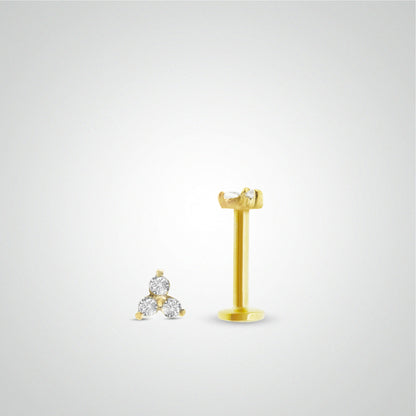Yellow gold tragus piercing with three white zircons (screwable)