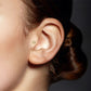 Piercing tragus or jaune avec rose et oxyde de zirconium (vissable)